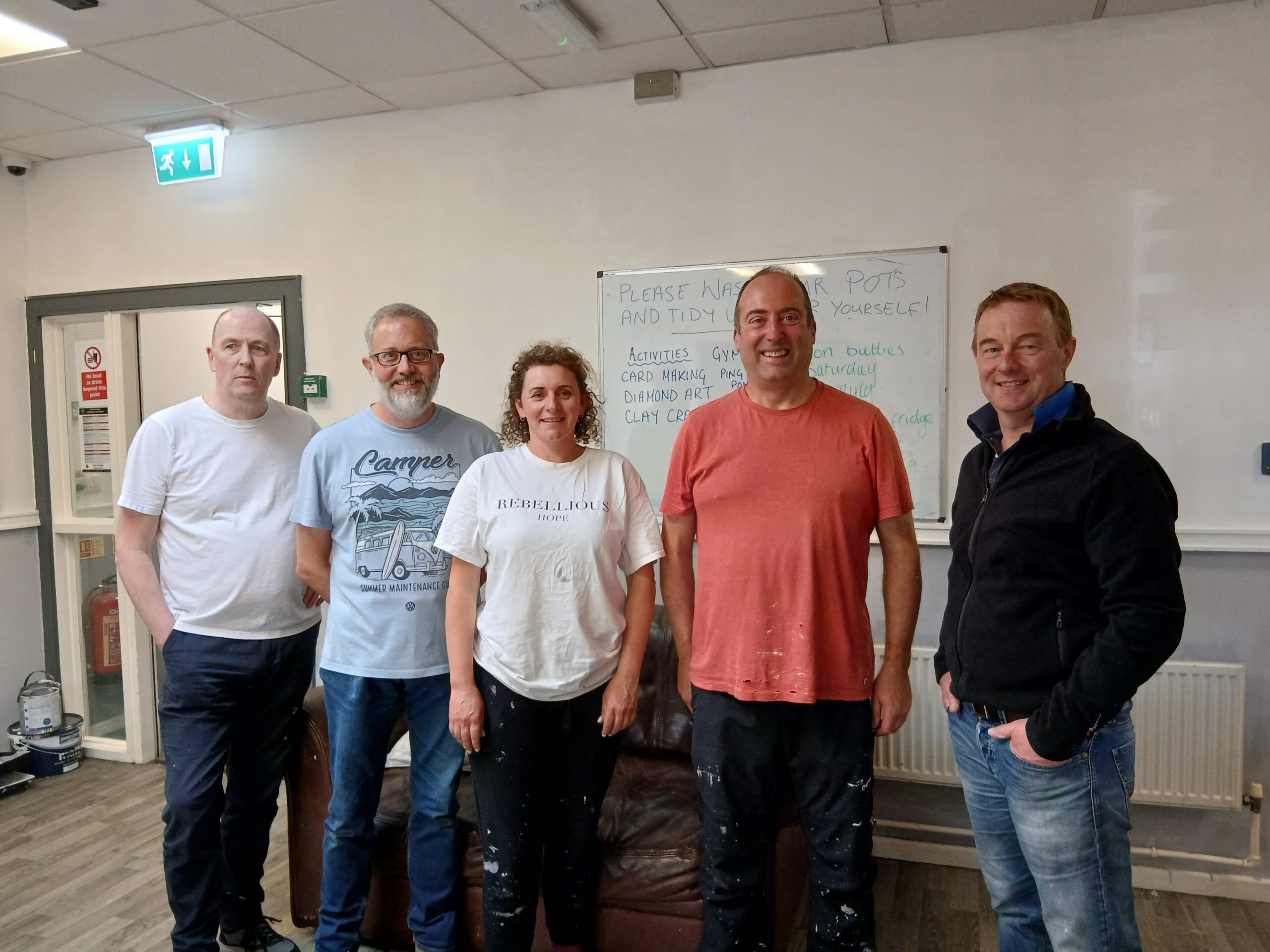 Avove Executive Leadership Team volunteer to redecorate a local shelter for The Brick.